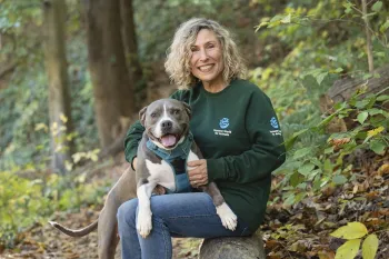 Kitty Block, President and CEO of the Humane World for Animals, poses with Mini